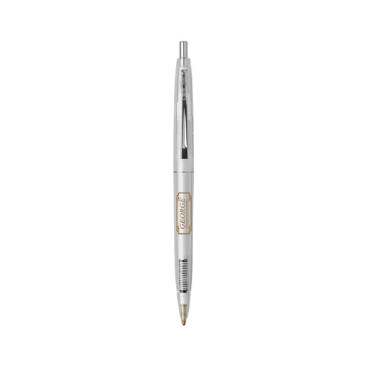 A clear plastic pen with a gold trim and a click mechanism, featuring a logo on the barrel.