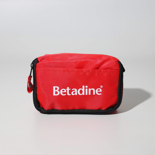 A red first aid travel kit with a zip closure and a logo on the front. Contains 13 essential first aid items.