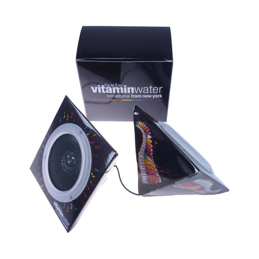 Pyramid foldable speakers in black with a colourful design, featuring a logo and a compact box for storage.