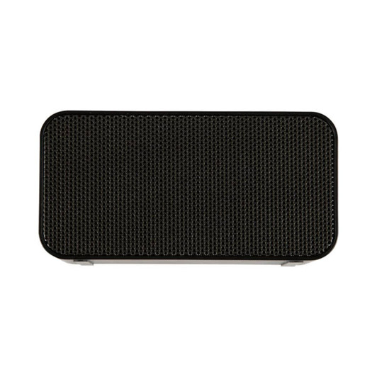 A rectangular black wireless charging speaker with a textured mesh grille on the front and a smooth finish.