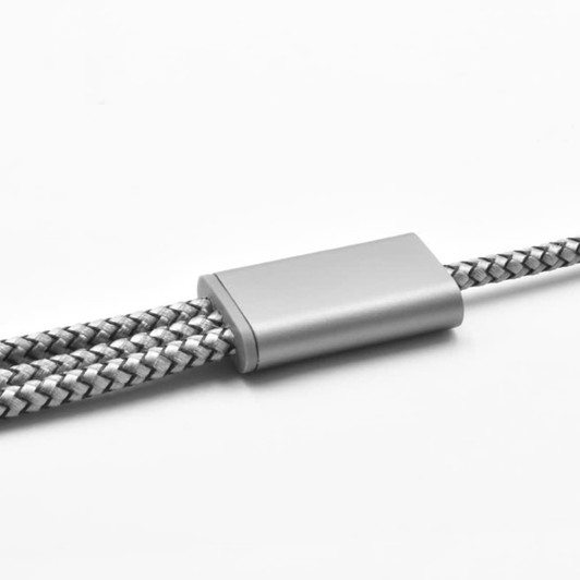 A charging cable with a silver metal connector and a braided grey and black design, featuring a logo.