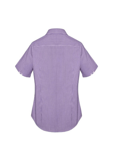 A short-sleeve women's button-up shirt in a purple check pattern, featuring a collar and a back yoke.