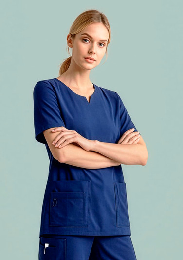 A navy women's scrub top featuring a round neck and two front pockets, styled with a model.