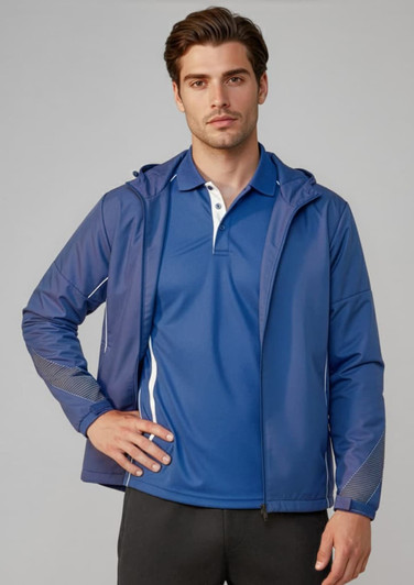 A man wearing a blue unisex jacket with a hood, paired with a blue polo shirt. The jacket features a logo.