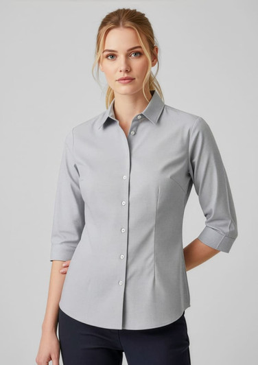 A grey women's button-up shirt with 3/4 sleeves and a fitted style, featuring a collar and a logo.