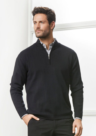 A black 80/20 wool pullover with a zip neck, featured on a male model against a light background.