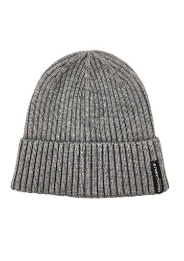 A grey unisex beanie with ribbed texture and a small logo on the side.