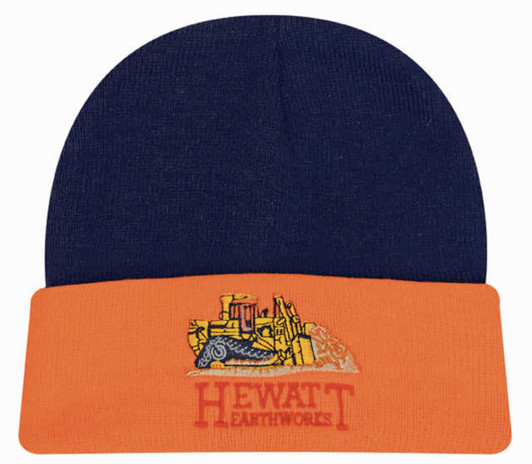 A navy and orange beanie featuring an illustration of construction equipment and a logo on the front.