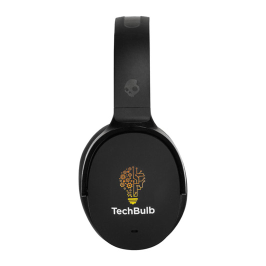A pair of black Skullcandy Hesh ANC wireless headphones with a logo on the ear cup.