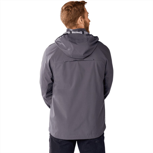 A grey men's softshell jacket with a hood, featuring a logo and a relaxed fit, viewed from the back.