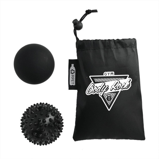 A black drawstring pouch containing a smooth black massage ball and a spiky black massage ball.