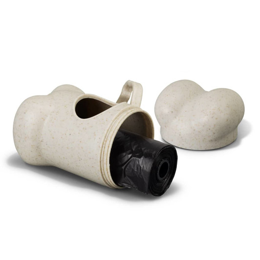 A natural-coloured pet bag dispenser with a rounded design, featuring a roll of black bags inside and a removable lid.