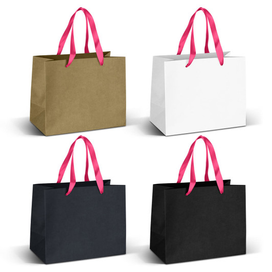 Medium ribbon handle paper bags in gold, white, and black, featuring bright pink handles. Each bag includes a logo.