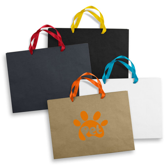 A collection of extra large paper bags in black, white, brown, and orange, each with a ribbon handle.