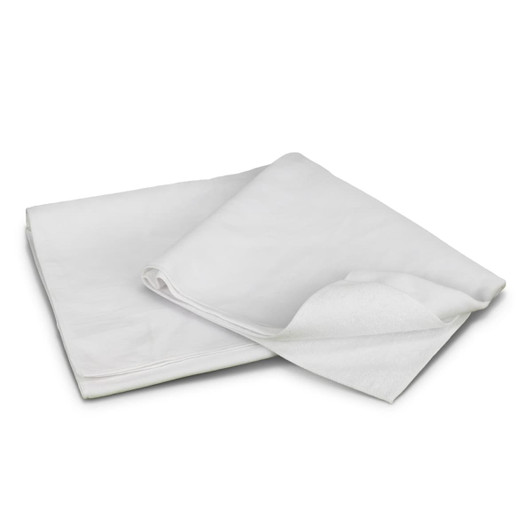 A white beach towel folded and slightly unfurled, with soft texture and a simple design. It has a logo.