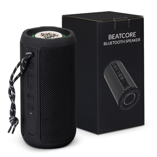 A black Bluetooth speaker with control buttons and a carrying strap next to its black box packaging.
