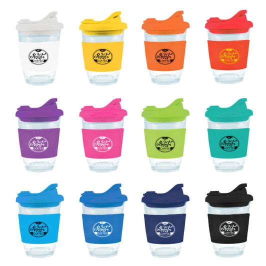 A collection of reusable coffee cups in various colors, featuring transparent bodies and snap lids. Each cup has a logo.