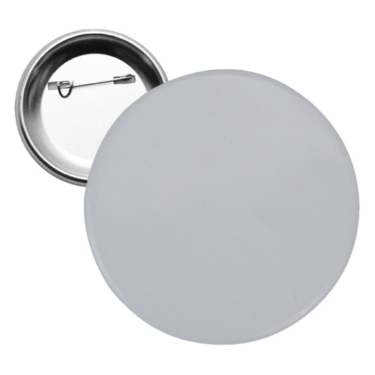 A round 44mm button badge in white with a silver backing and a clasp for pinning.