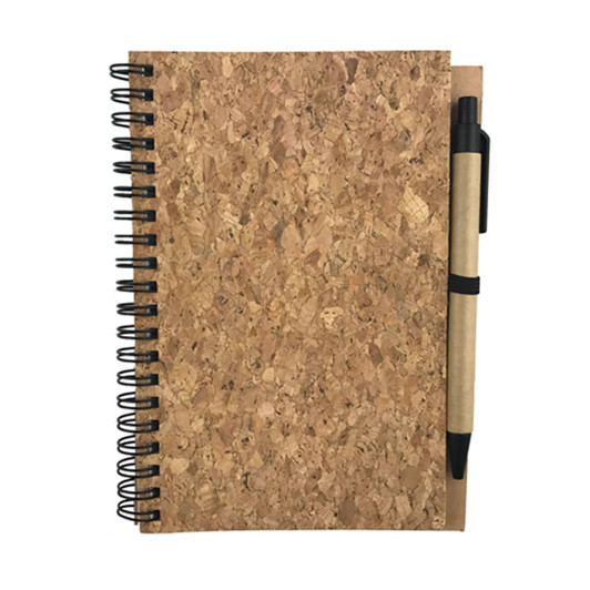 A cork-covered notebook with a spiral binding and a black pen attached, featuring natural earthy tones.