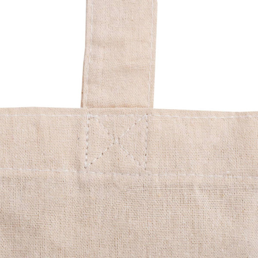 A cream-coloured tote bag with a gusset, featuring stitching details and a handle. It has a logo.