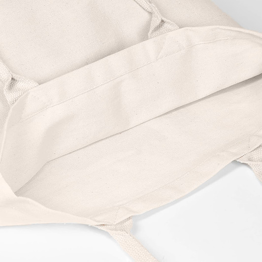 A cream-coloured tote bag with no gusset, featuring shoulder straps and an interior view. It has a logo.