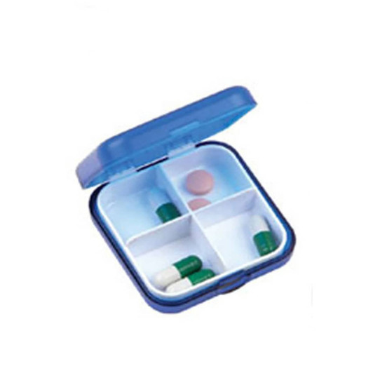 A blue pill box featuring four compartments, containing various pills in green and pink colours.