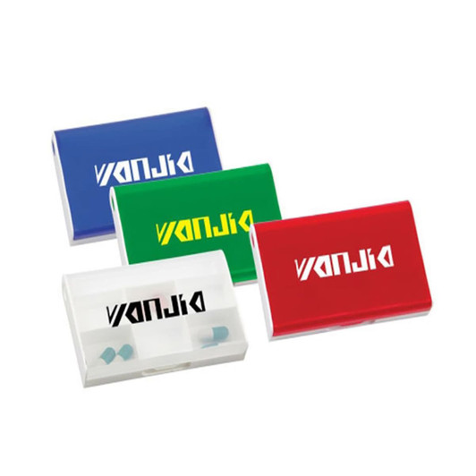 A set of four pill boxes in red, blue, green, and transparent white, each with a logo on the front.