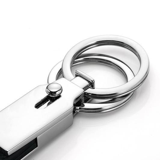 A silver multi key ring featuring a sleek design with two attached rings.