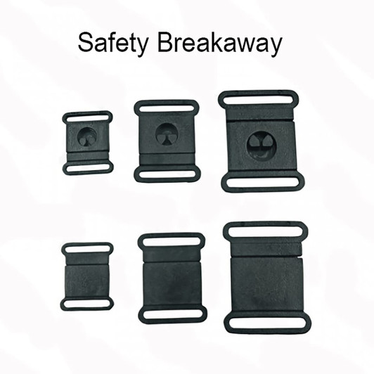 A collection of black safety breakaway clips in various sizes and shapes, designed for lanyards.