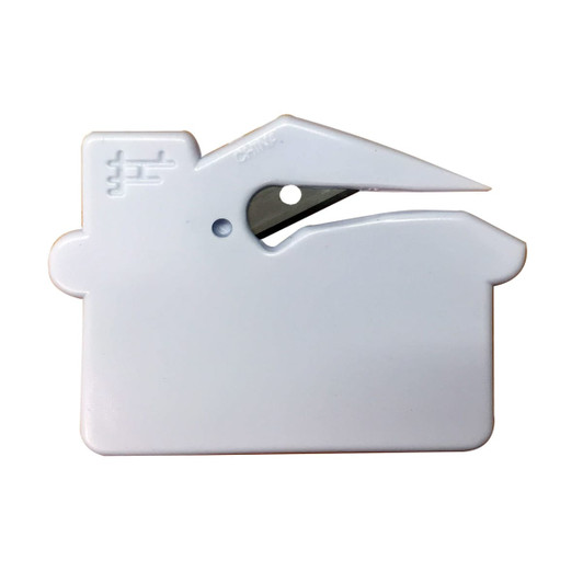 A white, house-shaped letter opener with a sharp blade and a logo visible on the surface.