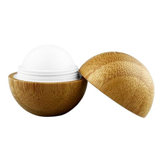 A bamboo lip balm ball with a natural wooden finish and a white balm interior. It features a lid that smoothly opens.