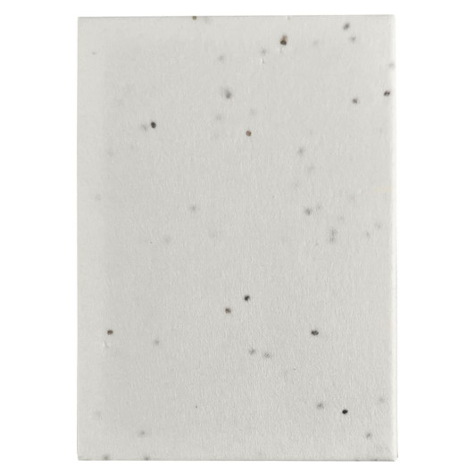 A sticky note pad featuring a speckled white design. The pad is rectangular in shape and has a smooth surface.