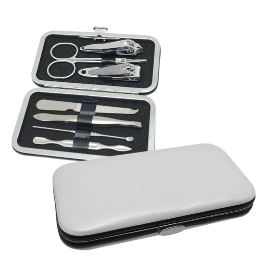 A silver and black manicure set with various tools, including nail clippers, scissors, and tweezers, in a sleek case.