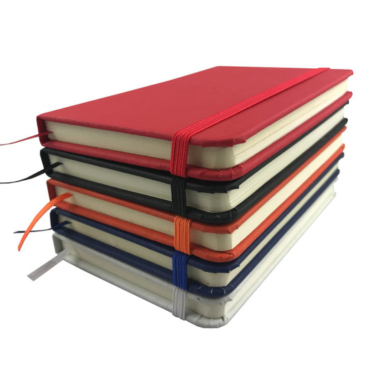 A stack of colourful notebooks including red, orange, blue, and black, featuring elastic bands and ribbon bookmarks.