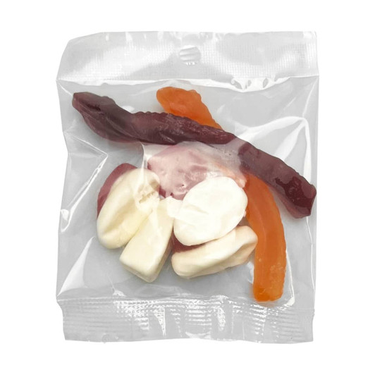 A clear packet containing mixed lollies including red, orange, and white jelly candies. Includes a branded logo.