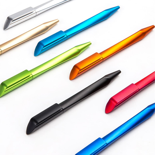 A collection of plastic pens in various colours: blue, green, gold, orange, black, and red, arranged neatly.