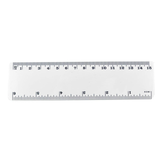 A clear plastic ruler measuring 15 cm, featuring black markings for both centimetres and inches.