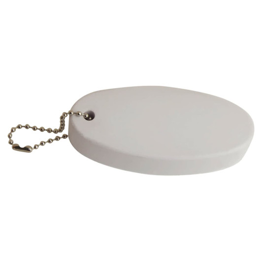 A white floating key ring with a rounded, oval shape and a metal chain for attachment.