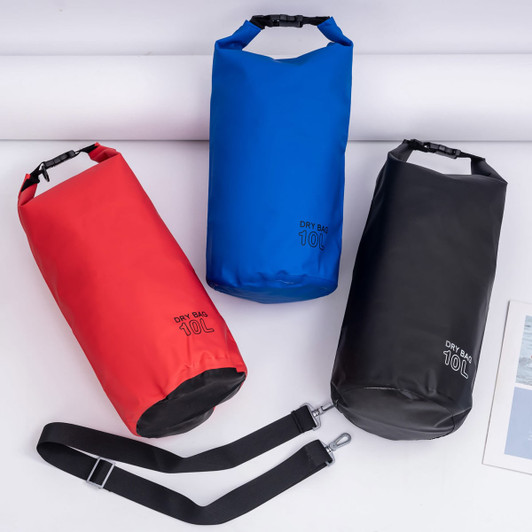Three dry bags in red, blue, and black, each with a logo and a removable strap.