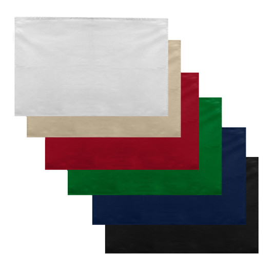 A set of cotton tea towels in white, beige, red, green, navy, and black, arranged in a stacked formation.