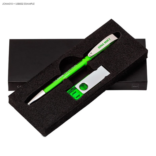 A green pen, a sharpener, and a ruler, all presented in a black gift box with a logo.