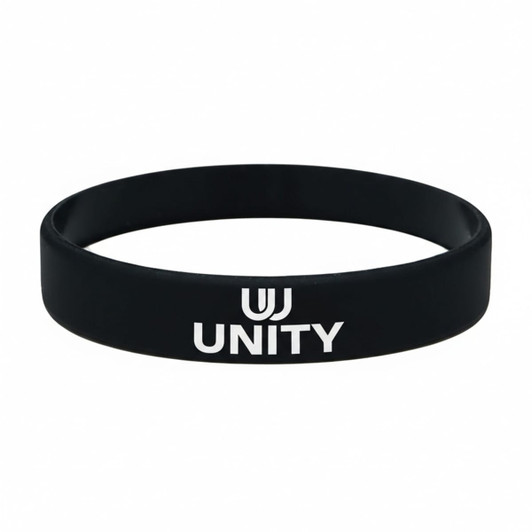 A black silicone wristband with the word "UNITY" printed in white and a logo on it.