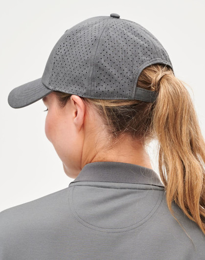 A grey 4-way stretch cap with laser-cut perforations and an adjustable strap at the back.