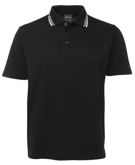 A black chef polo featuring a white check-pattern collar and buttons. It has a logo on the sleeve.