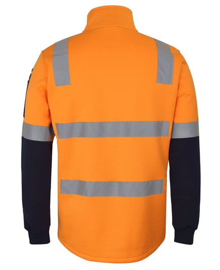 A fleecy 1/2 zip sweater in bright orange and navy with reflective strips and a logo on the sleeve.