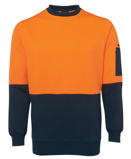 An orange and navy work jumper featuring a pocket and a logo on the sleeve.