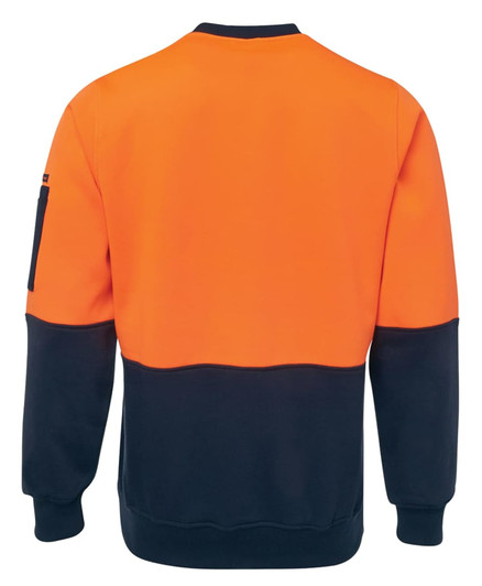 A work jumper featuring a bright orange upper section and a navy lower section, with a logo on the sleeve.