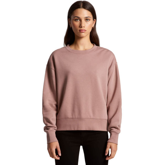 A pink jumper with a relaxed fit and long sleeves, featuring a crew neckline and a logo.