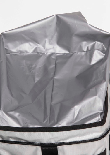 A grey insulated cooler bag with a zip closure and a waterproof interior liner. It features a black trim and handle.