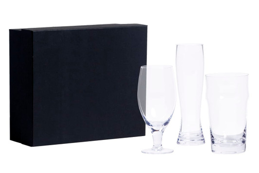 A set of three clear beer glasses in a black box, featuring distinct shapes and sizes for different beer styles.